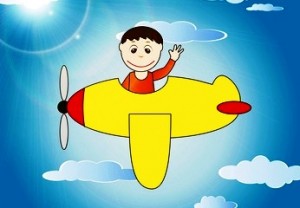 Happy small boy in airplane